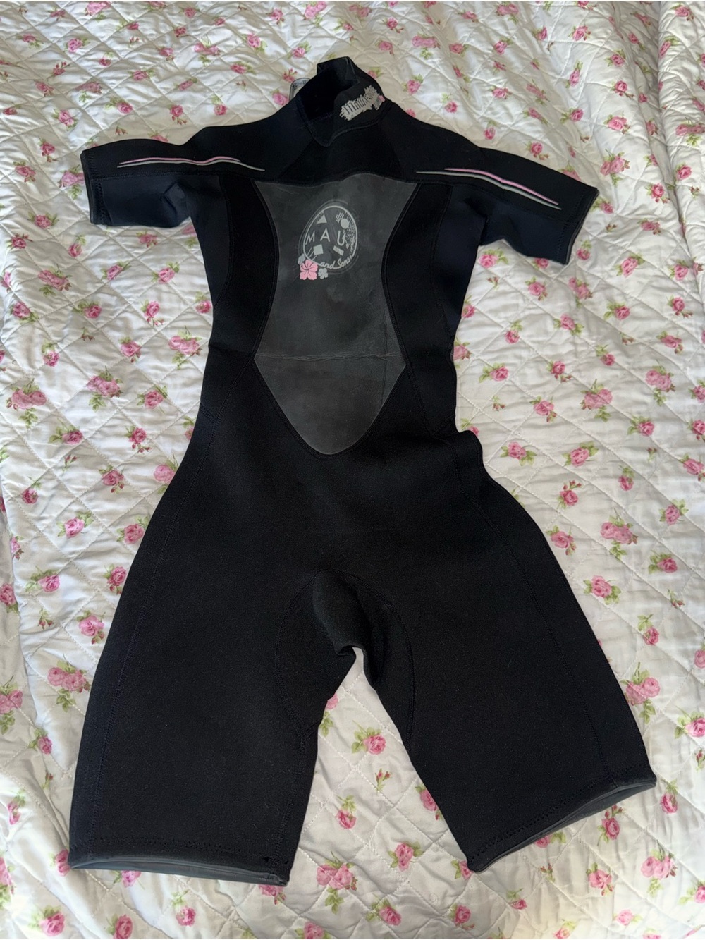 Black Maui surf wetsuit with pink floral design, size S